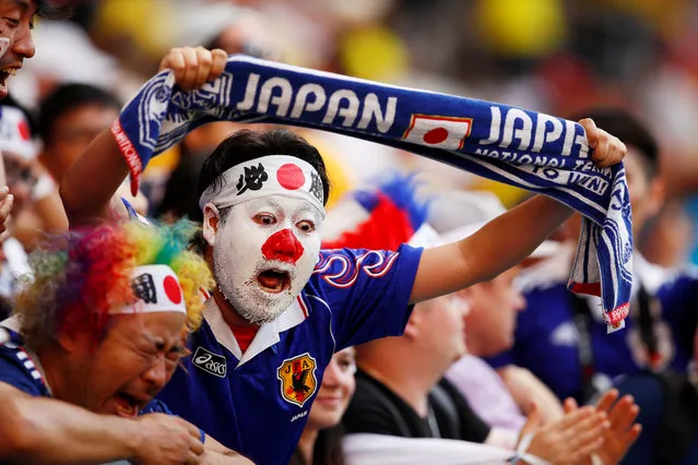 Japan fans celebrate after the Russia 2018 World Cup Group H football match between Colombia and Japan at the Mordovia Arena in Saransk on June 19, 2018. (Photo by Jason Cairnduff/Reuters)