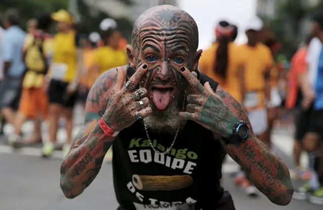 A runner with tattoos on his body and his eyes is pictured before the annual "Sao Silvestre Run" (Saint Silvester Road Race), an international race through the streets of Sao Paulo, Brazil, December 31, 2015. (Photo by Nacho Doce/Reuters)