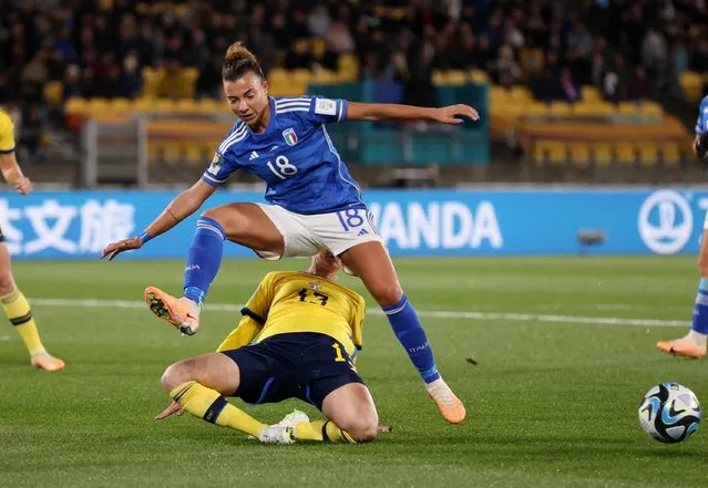 Italy's midfielder #18 Arianna Caruso (up) fights for the ball with Sweden's defender #13 Amanda Ilestedt (down) during the Australia and New Zealand 2023 Women's World Cup Group G football match between Sweden and Italy at Wellington Stadium, also known as Sky Stadium, in Wellington on July 29, 2023. (Photo by Amanda Perobelli/Reuters)