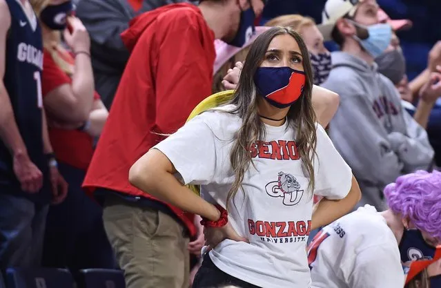 A Gonzaga Bulldogs student reacts after a Bulldog turnover against Baylor in the National Championship game of the 2021 NCAA Men's Basketball Tournament at Lucas Oil Stadium on April 05, 2021 in Indianapolis, Indiana. (Photo by James Snook/USA TODAY Sports)