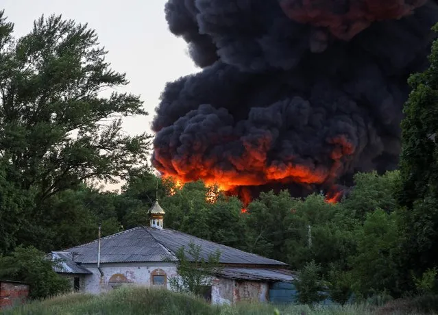 Smoke rises after shelling during Ukraine-Russia conflict in Donetsk, Ukraine on July 7, 2022. (Photo by Alexander Ermochenko/Reuters)