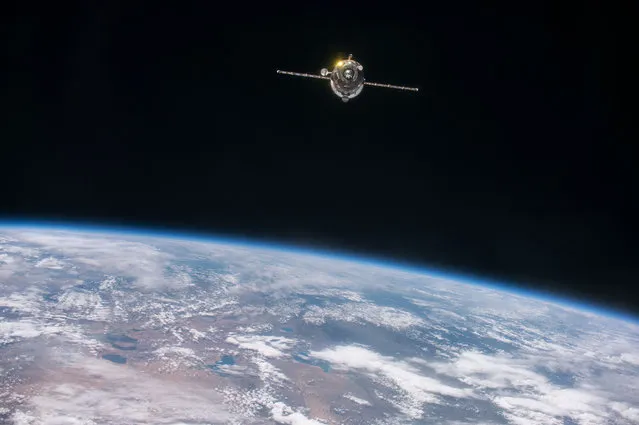 The undocked Russian Progress 62 spacecraft backs away from the International Space Station for a test of the upgraded tele-robotically operated rendezvous system, or the TORU manual docking system. (Photo by NASA)