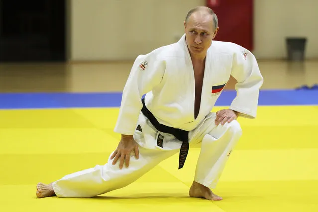 Russian President Vladimir Putin takes part in a training session with members of the Russian national judo team in Sochi on February 14, 2019. (Photo by Mikhail Klimentyev/TASS)