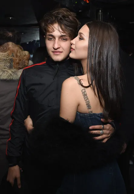 Anwar Hadid (L) and Bella Hadid attend NY Poison Club hosted by Dior with Camille Rowe on January 31, 2017 in New York City. (Photo by Dimitrios Kambouris/Getty Images for Dior Beauty)