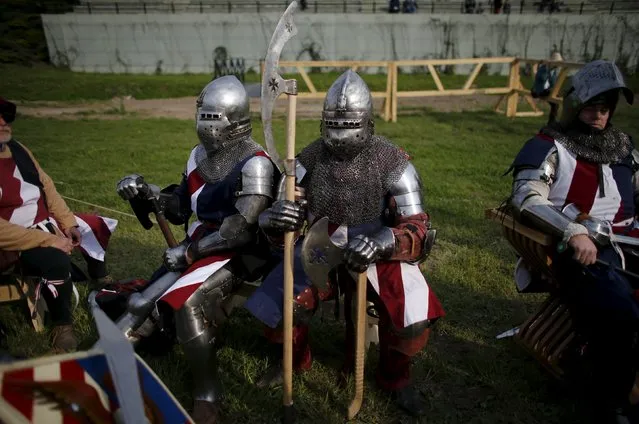 Members of U.S. team wait for the fights during break at the Medieval Combat World Championship at Malbork Castle, northern Poland, April 30, 2015. (Photo by Kacper Pempel/Reuters)