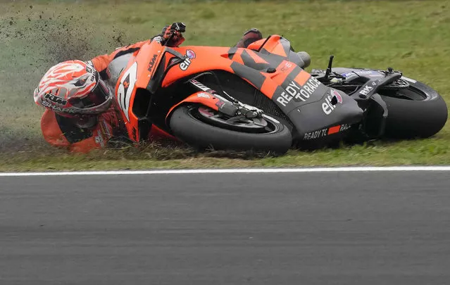 KTM rider Iker Lecuona, of Spain, falls down during the MotoGP qualifying session for Sunday's Emilia Romagna Motorcycle Grand Prix at the Misano circuit in Misano Adriatico, Italy, Saturday, October 23, 2021. (Photo by Antonio Calanni/AP Photo)