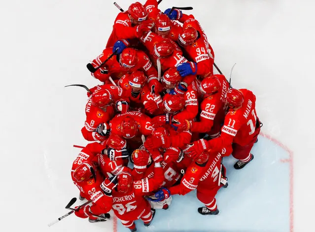 Russia's players celebrate after winning the Men's Ice Hockey World Championships bronze medal match between Russia and Czech Republic in Bratislava, Slovakia on May 26, 2019. (Photo by David W. Cerny/Reuters)