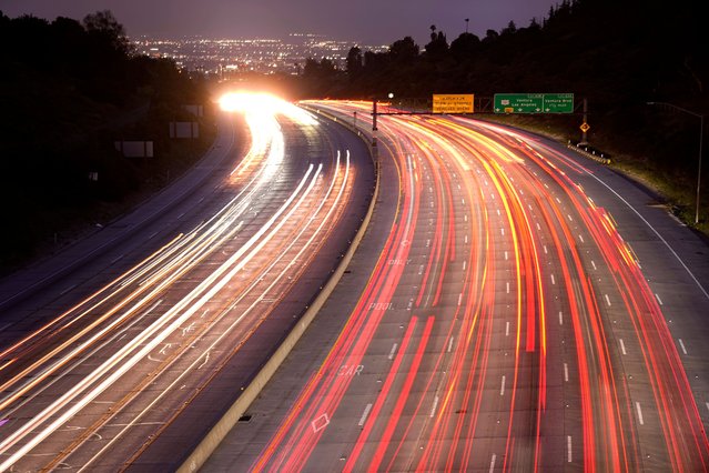 Traffic slowly moves along Interstate 405 on Thursday, May 23, 2024, in the Bel Air section of Los Angeles. Highways and airports are likely to be jammed in the coming days as Americans head out on and home from Memorial Day weekend getaways. (Photo by Mark J. Terrill/AP Photo)