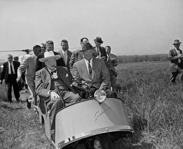 Sir Winston Churchill and President Eisenhower use the Chief Executive's electric car for a tour of the Eisenhower farm here on May 6, 1959 in Gettysburg, Pa.  The President and Churchill flew here from the White House by helicopter. (Photo by AP Photo)