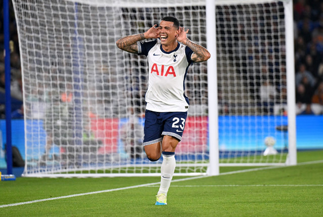 Pedro Porro of Tottenham Hotspur celebrates scoring his team's first goal during the Premier League match between Leicester City FC and Tottenham Hotspur FC at The King Power Stadium on August 19, 2024 in Leicester, England. (Photo by Michael Regan/Getty Images)