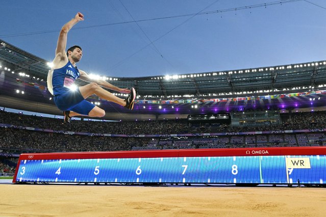 Greece's Miltiadis Tentoglou competes in the men's long jump final of the athletics event at the Paris 2024 Olympic Games at Stade de France in Saint-Denis, north of Paris, on August 6, 2024. (Photo by Andrej Isakovic/AFP Photo)