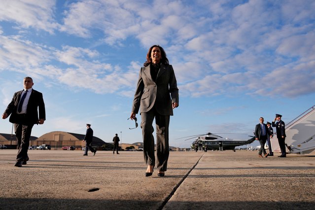 Democratic presidential nominee Vice President Kamala Harris walks over to speak to members of the media upon her arrival at Andrews Air Force Base, Maryland on September 22, 2024. (Photo by Matt Rourke/Reuters)