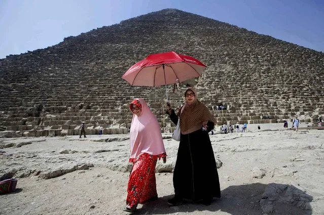 Indonesian visit the Great Pyramid, built by Cheops, known locally as Khufu in Giza, Egypt, Thursday, June 2, 2016. (Photo by Amr Nabil/AP Photo)
