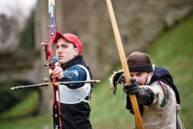 Team GB Olympic archery hopeful Tom Hall (left) pits his skills against Warwick Castle's experienced bowman Lewis Copson during the Medieval v Olympic Archery match at Warwick Castle, England on February 10, 2020. (Photo by Jacob King/PA Images via Getty Images)