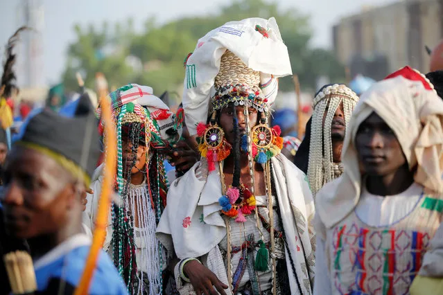 Traditionalists wearing local regalia attend the durbar festival on the second day of Eid-al-Fitr celebrations in Nigeria's northern city of Kano, July 7, 2016. (Photo by Akintunde Akinleye/Reuters)