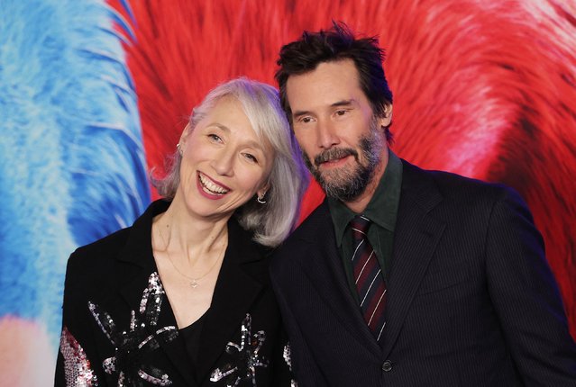 US visual artist Alexandra Grant (L) and Canadian actor Keanu Reeves arrive for the premiere of “Sonic The Hedgehog 3” at the TCL Chinese Theatre in Hollywood, California, on December 16, 2024. (Photo by Michael Tran/AFP Photo)