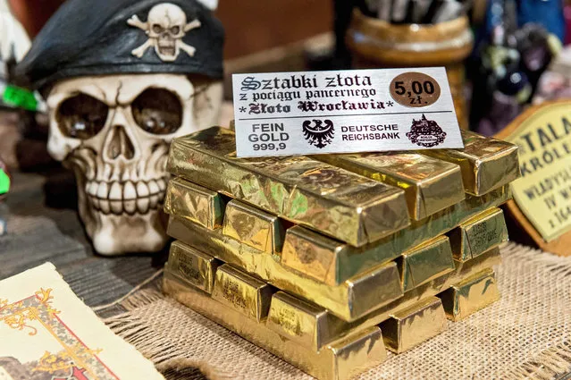 Chocolate Gold Bars, souvenirs inspired by the quest for the so-called Nazi Gold Train are on display for sale at Ksiaz Castle in Walbrzych, Poland, 04 Septemeber 2015. Peter Koper and Andreas Richter claimed that have discovered an armoured train from World War II in the area of Walbrzych (Lower Silesia province), which has been dubbed by the media the Nazi Gold Train. Earlier today, on the request of the Mayor of Walbrzych, Polish Army inspected the alleged area, where the train could be located. (Photo by Maciej Kulczynski/EPA)
