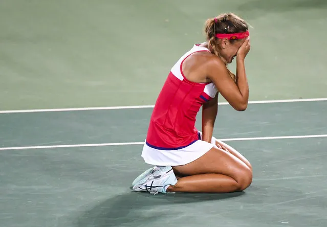 Monica Puig (PUR) reacts after she captured the  Gold Medal with a win over Angelique Kerber (GER)  in tennis during the Olympic Games on August 13, 2016 in Rio De Janeiro, Brazil. (Photo by Jonathan Newton/The Washington Post)