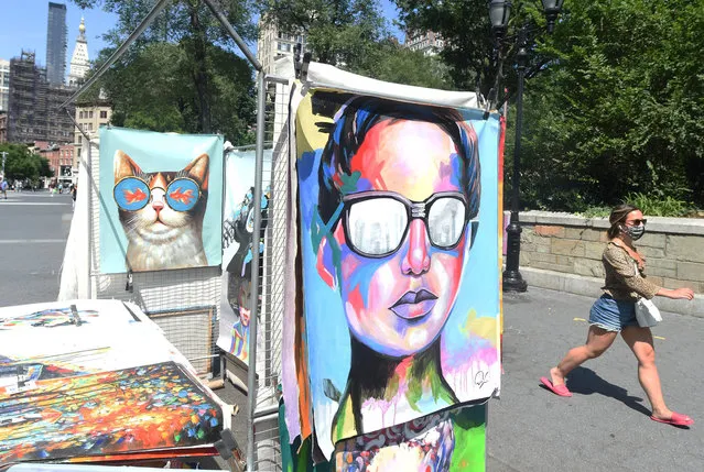 An art vendor in Union Square Park on a summer day on July 16, 2020 in New York. Heat wave expected starting Saturday with temps in 90s. (Photo by Helayne Seidman/The New York Post)