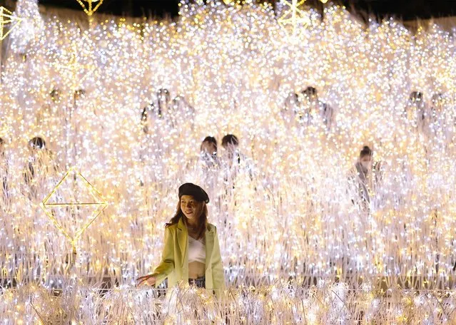 An illumination is held at a commercial facility “NAMBA PARKS” in Osaka City, Osaka Prefecture on November 15, 2022. Approximately 650,000 LED (light-emitting diode) bulbs are decorated to imagine waterfalls and meadows at the event. (Photo by Naoya Azuma/Yomiuri/The Yomiuri Shimbun via AFP Photo)