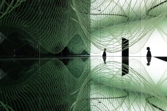 A woman walks through the Japan Pavilion during the media day held ahead of the Expo 2025 Osaka, Kansai, Japan on April 09, 2025 in Osaka, Japan. The World Expo 2025 in Osaka, Japan, is a significant global event themed “Designing Future Society for Our Lives”, focusing on technological innovation and sustainable development. Against the backdrop of Trump's trade tariffs, the Expo serves as a platform for Japan to showcase its commitment to multilateral cooperation and technological leadership while fostering diplomatic ties and economic partnerships, particularly with ASEAN and China. (Photo by Tomohiro Ohsumi/Getty Images)