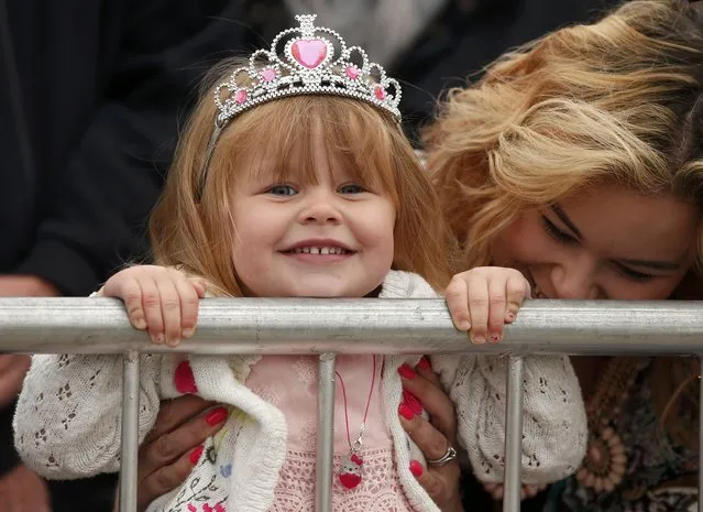 Lyra Crew aged two waits for Britain's Queen Elizabeth and Prince Philip to arrive at Tweedbank Station in Scotland, Britain September 9, 2015. (Photo by Phil Noble/Reuters)