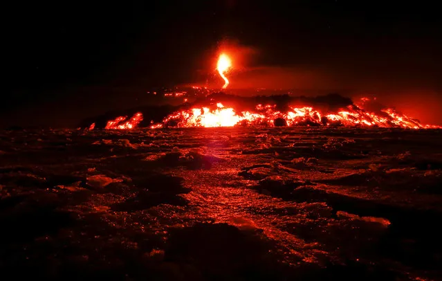 Italy's Mount Etna, Europe's tallest and most active volcano, spews lava as it erupts on the southern island of Sicily, Italy, February 28, 2017. (Photo by Antonio Parrinello/Reuters)