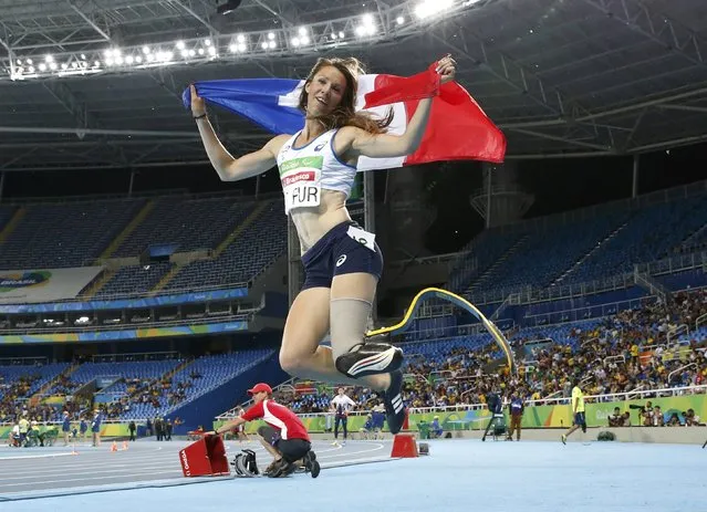 2016 Rio Paralympics, Athletics, Women's 400m, T44 Final, Olympic Stadium, Rio de Janeiro, Brazil on September 12, 2016. Marie-Amelie le Fur of France celebrates after winning the gold medal in the event. (Photo by Carlos Garcia Rawlins/Reuters)