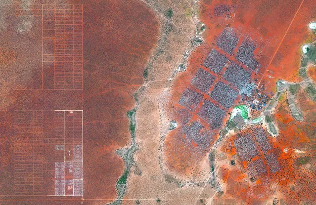 Hagadera, seen here on the right, is the largest section of the Dadaab refugee camp in northern Kenya and is home to 100,000 refugees. To cope with the growing number of displaced Somalis arriving at Dadaab, the UN has begun moving people into a new area called the LFO extension, seen here on the left. Dadaab is the largest refugee camp in the world with an estimated total population of 400,000. (Photo by Benjamin Grant/Penguin Random House)