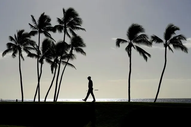 Kyle Stanley walks across the 17th green during the first round of the Sony Open golf tournament, Thursday, January 12, 2023, at Waialae Country Club in Honolulu. (Photo by Matt York/AP Photo)