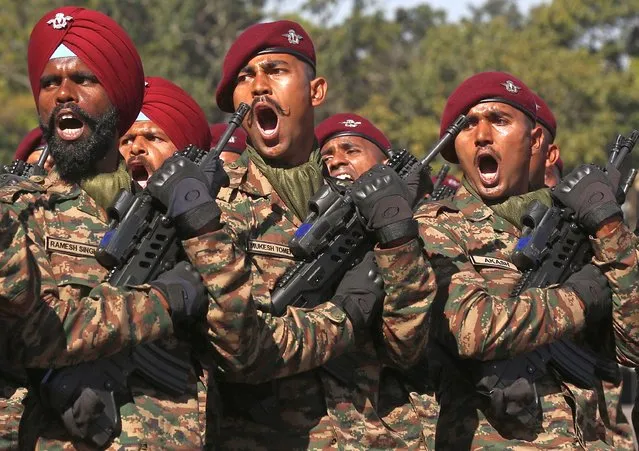 Members of the Indian army take part in the 'Indian Army Day' parade at Madras Engineer Group (MEG) in Bangalore, India, 15 January 2023. The 75th Army Day parade was held in the southern Indian city of Bangalore, for the first time outside the national capital. The Indian Army Day is annually celebrated on 15 January. (Photo by Jagadeesh N.V./EPA/EFE)