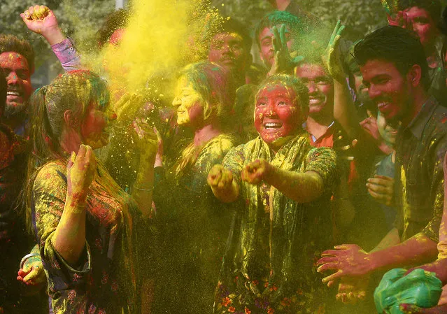 Students celebrate the Holi festival  on March 1, 2018 in New Delhi, India. (Photo by Raj K. Raj/Hindustan Times via Getty Images)