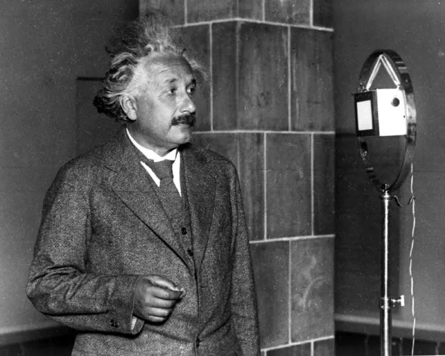 Professor Albert Einstein at the microphone, congratulates Thomas  Edison on the 50 years anniversary of the first electric lamp, by telephone from Berlin to America, on October 18, 1930. (Photo by AP Photo)