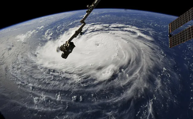 This photo provided by NASA shows Hurricane Florence from the International Space Station on Monday, September 10, 2018, as it threatens the U.S. East Coast. Forecasters said Florence could become an extremely dangerous major hurricane sometime Monday and remain that way for days. (Photo by NASA via AP Photo)