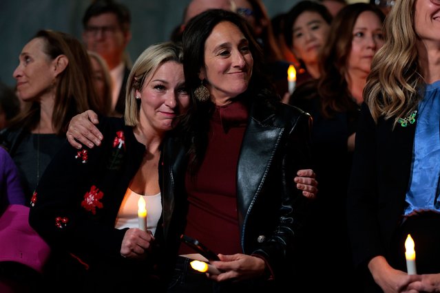 Jeffrey Epstein abuse survivor Danielle Bensky, left, and Lauren Hersh, the national director of the coalition World Without Exploitation, embrace each other in Washington, DC, after learning that the US Senate had agreed to pass the Epstein files legislation on Tuesday, November 18, 2025. (Photo by Heather Diehl/Getty Images)
