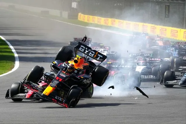 Red Bull driver Sergio Perez of Mexico, front, crashes with Ferrari driver Charles Leclerc of Monaco at the start of the Formula One Mexico Grand Prix auto race at the Hermanos Rodriguez racetrack in Mexico City, Sunday, October 29, 2023. (Photo by Fernando Llano/AP Photo)