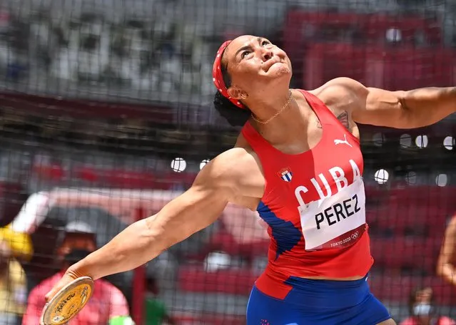 Cuba's Yaime Perez competes in the women's discus throw qualification during the Tokyo 2020 Olympic Games at the Olympic Stadium in Tokyo on July 31, 2021. (Photo by Dylan Martinez/Reuters)