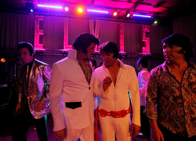 Elvis Presley tribute artists gather on stage during a competition at the 25th annual Parkes Elvis Festival in the rural Australian town of Parkes, west of Sydney, Australia January 13, 2017. (Photo by Jason Reed/Reuters)