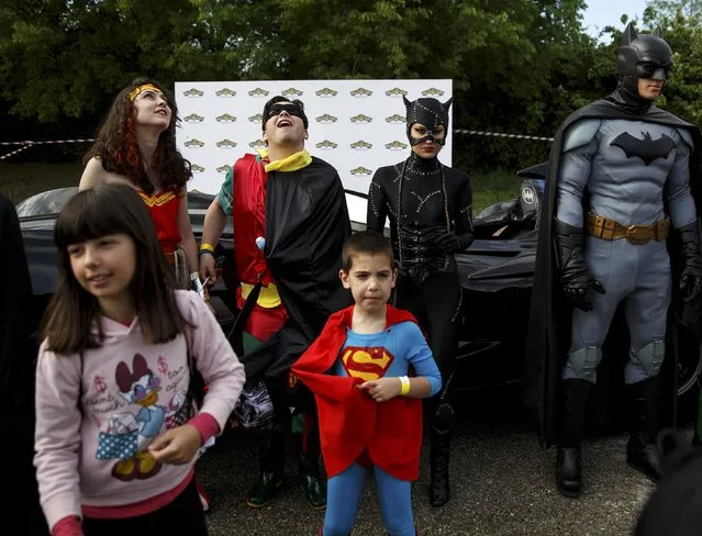 Participants wearing superhero costumes attend the World DC Comics Super Heroes event in San Martin de Valdeiglesias, near Madrid, April 18, 2015. (Photo by Andrea Comas/Reuters)