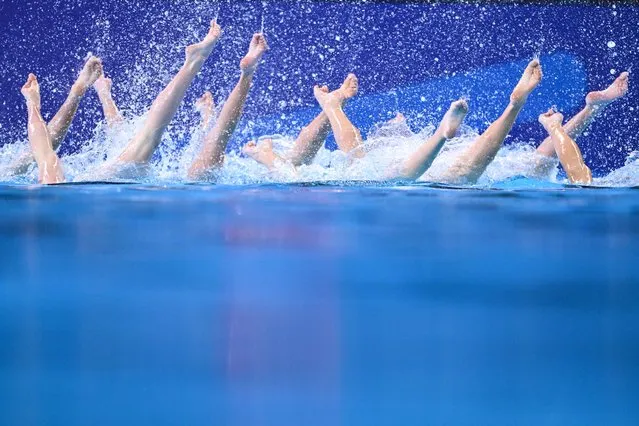 Team Slovakia competes in the preliminary round of the team technical artistic swimming event during the 2024 World Aquatics Championships at Aspire Dome in Doha on February 5, 2024. (Photo by Sebastien Bozon/AFP Photo)