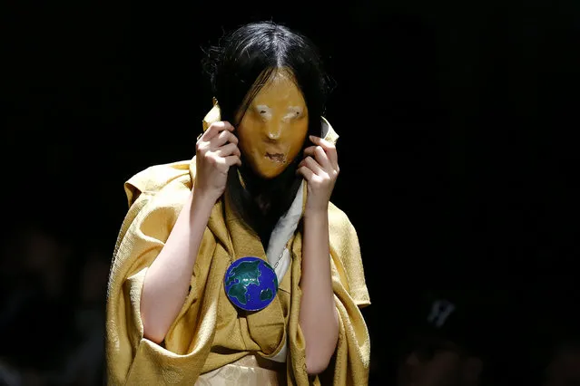 A model presents a creation by designer writtenafterwards during the Autumn/Winter 2016 Tokyo Fashion Week in Tokyo, Japan, March 16, 2016. (Photo by Thomas Peter/Reuters)