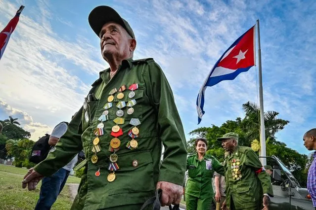 Cuban veterans participate in a parade commemorating the 65th anniversary of Fidel Castro's entry in Havana on January 8, 2024. (Photo by Adalberto Roque/AFP Photo)