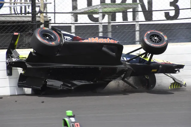 The car driven by Sebastien Bourdais, of France, hits the wall in the third turn during the Indianapolis 500 IndyCar auto race at Indianapolis Motor Speedway, Sunday, May 26, 2019, in Indianapolis. (Photo by Scott Anderson/AP Photo)