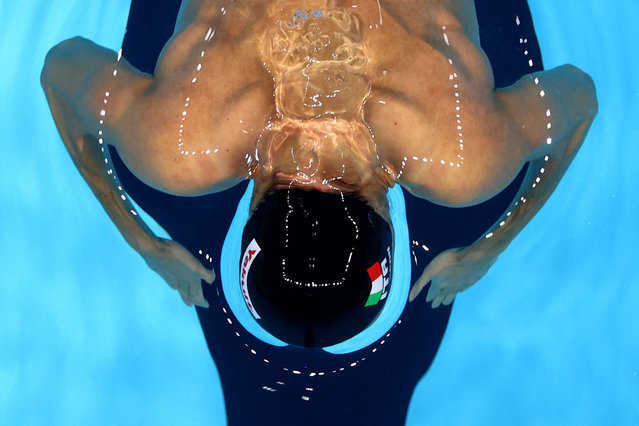 Thomas Ceccon of Italy competes in the Men's 50m Butterfly heat during day four of the FINA World Swimming Championships (25m) Abu Dhabi at Etihad Arena on December 19, 2021 in Abu Dhabi. (Photo by Clive Rose/Getty Images)