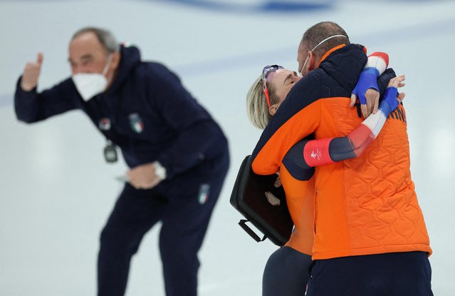 Coach Jillert Anema of Team Netherlands and Irene Schouten of Team Netherlands celebrate winning the gold medal during the Women's 3000m on day one of the Beijing 2022 Winter Olympic Games at National Speed Skating Oval on February 05, 2022 in Beijing, China. (Photo by Phil Noble/Reuters)