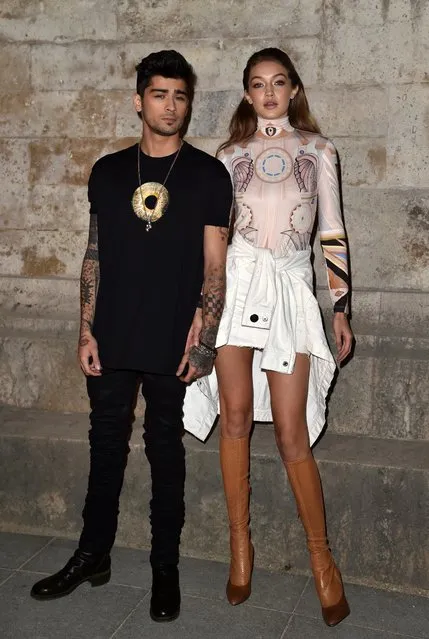 British singer Zayn Malik and American model Gigi Hadid attend the Givenchy show as part of the Paris Fashion Week Womenswear Spring/Summer 2017 on October 2, 2016 in Paris, France. (Photo by Pascal Le Segretain/Getty Images)
