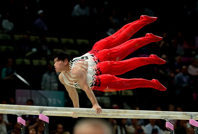 Multiple exposure of Daiki Hashimoto of Japan on the Parallel Bars during the Men Qualification of the Artistic Gymnastics competitions in the Paris 2024 Olympic Games, at the Bercy Arena in Paris, France, 27 July 2024. (Photo by Christian Bruna/EPA/EFE)