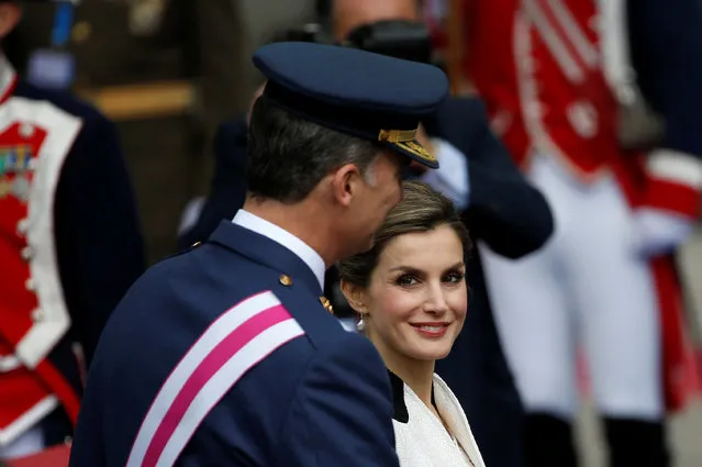 Spain's King Felipe and Queen Letizia attend a ceremony marking Spain's Armed Forces Day in Madrid, Spain, May 28, 2016. (Photo by Susana Vera/Reuters)