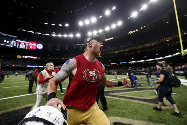 San Francisco 49ers tight end George Kittle celebrates after defeating the New Orleans Saints on a last second field goal, which was set up by his pass reception, after an NFL football game in New Orleans, Sunday, December 8, 2019. The 49ers won 48-46. (Photo by Butch Dill/AP Photo)