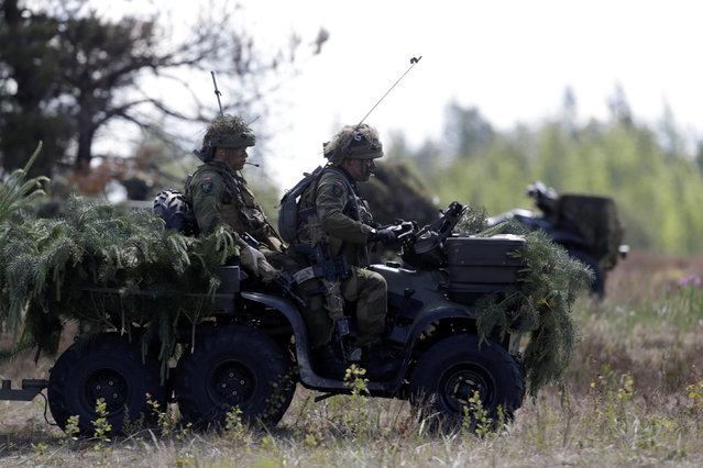 Norwegian army soldiers take part in the “Saber Strike” NATO military exercise in Adazi, Latvia, June 13, 2016. (Photo by Ints Kalnins/Reuters)